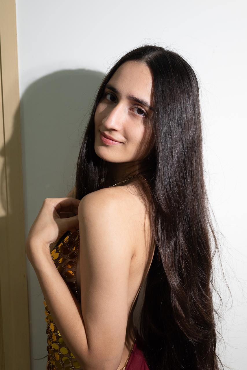 Professional portrait of Akanksha in white
